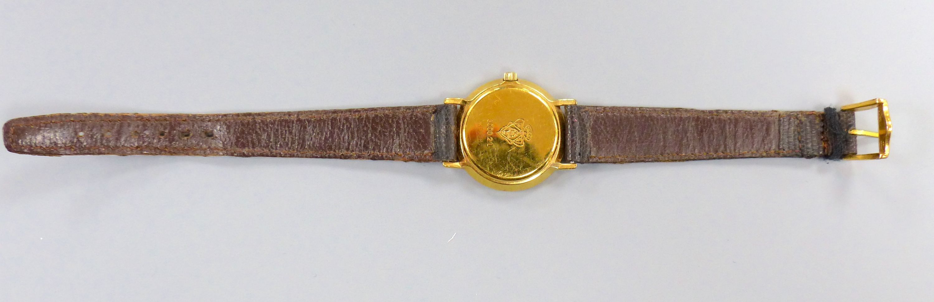 Five pairs of yellow metal and gem set earrings, gross 20.3 grams, three assorted yellow metal rings(a.f.) and a watch.